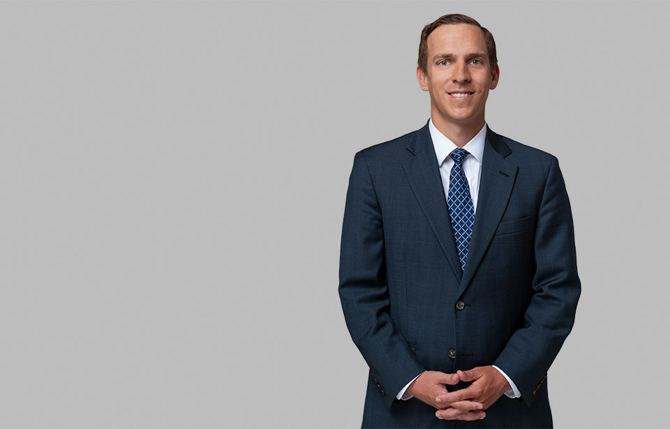 Standing photo of Environmental and Litigation attorney Ben Piper