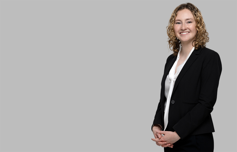 Standing photo of Litigation attorney Ellie Quinby