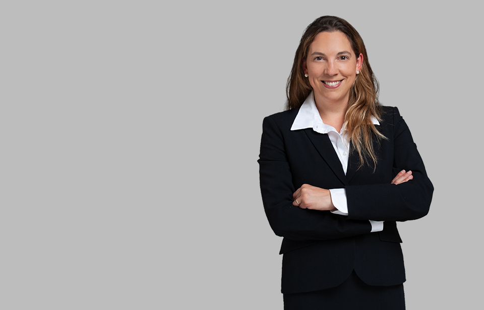 Standing photo of Corporate and M&A and Immigration attorney Mariana Baron
