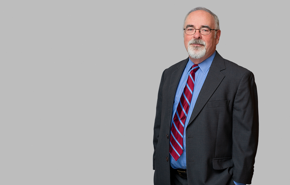 Standing photo of Energy and Telecommunications attorney Joe Donahue