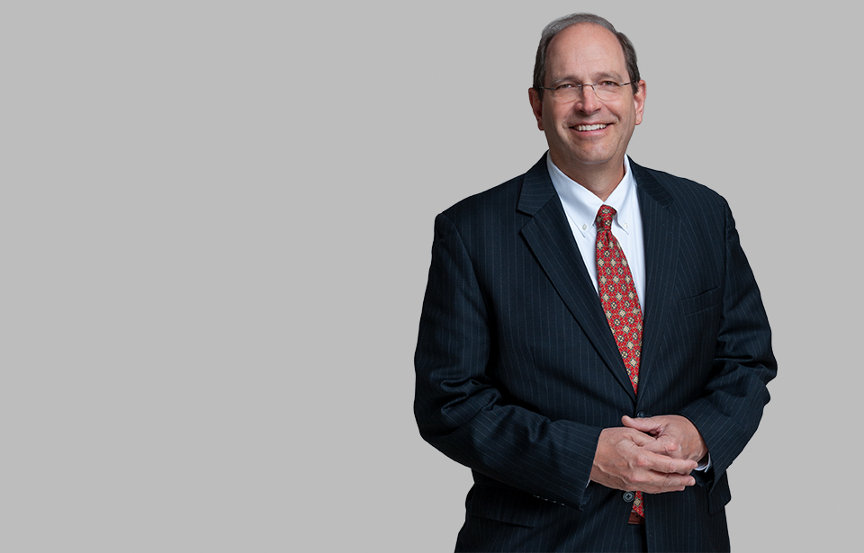 Standing photo of Litigation attorney Greg Hansel