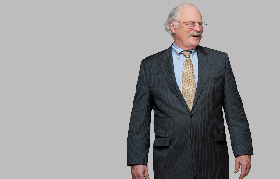 Standing photo of Creditors’ Rights and Bankruptcy attorney John McVeigh