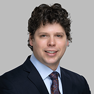 Headshot of Real Estate and Finance and Corporate and M&A attorney Spencer Hoffman