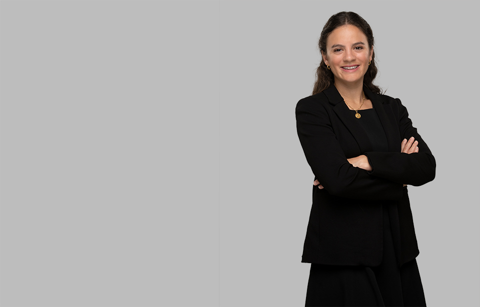 Standing photo of Corporate and M&A attorney Paola Maymi