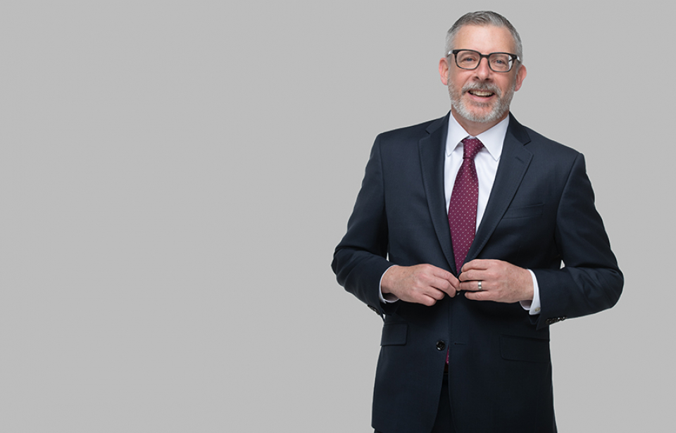 Standing photo of Energy and Telecommunications attorney Dan Collins