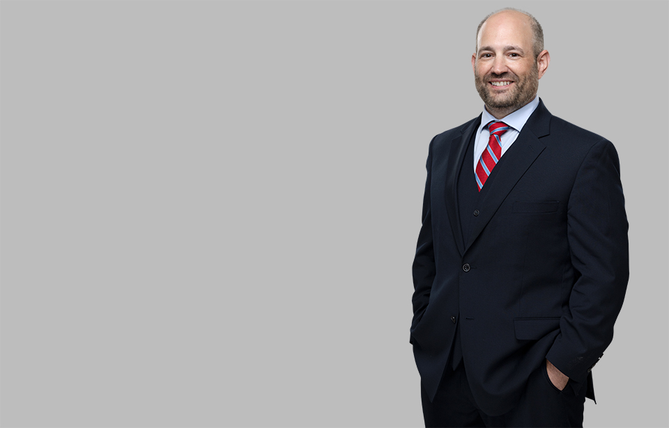 Standing photo of Intellectual Property attorney Tom Druan