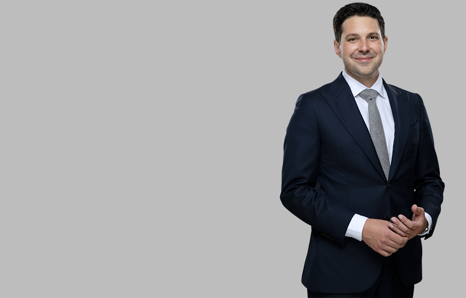 Standing photo of Energy and Telecommunications attorney Nick Janzen